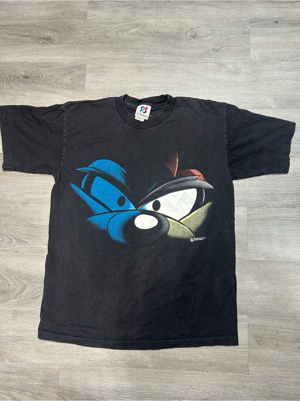 Vintage 1994 Signal brand black Looney Tunes t-shirt featuring Taz graphic Sz L